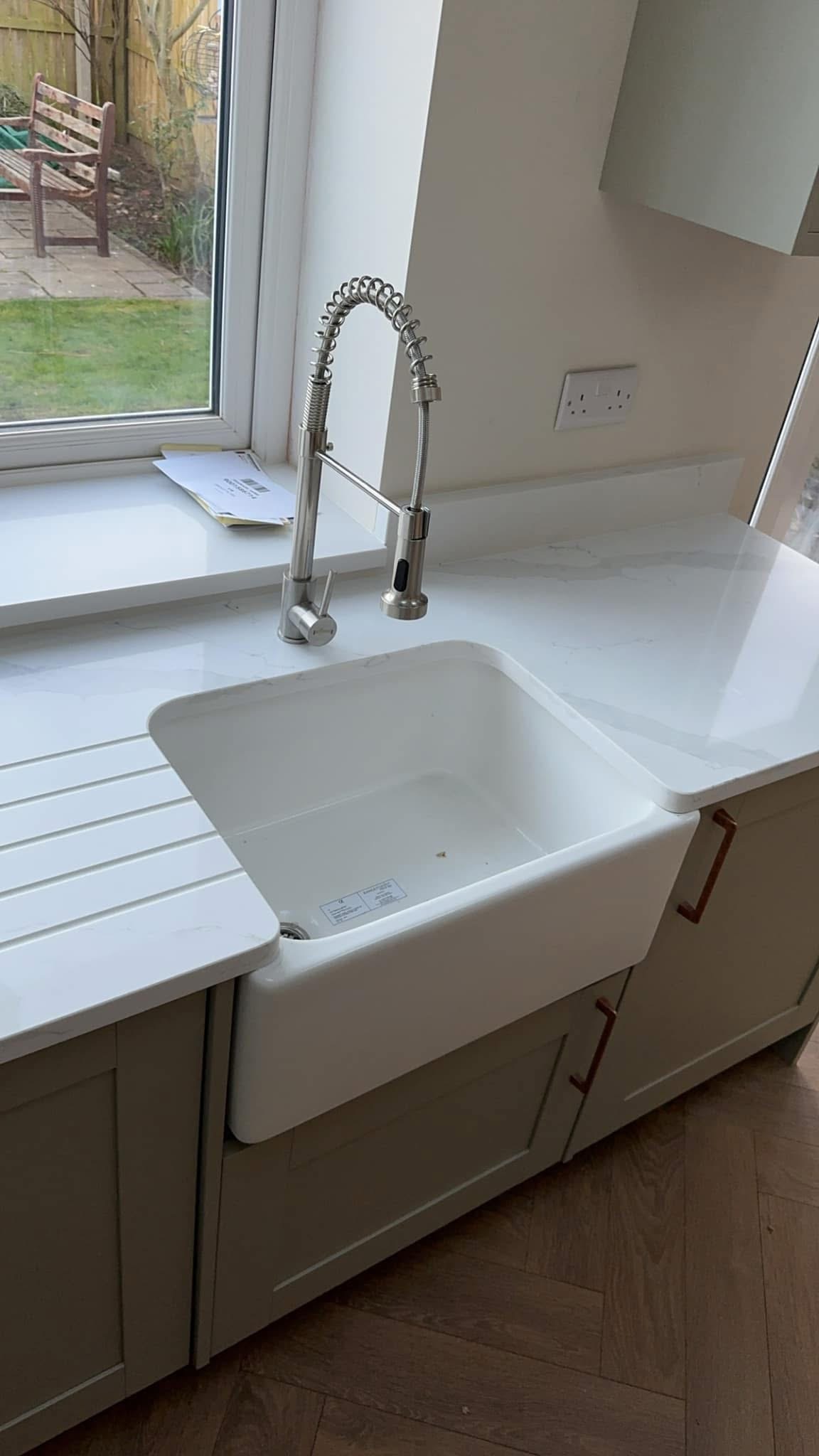 Kitchen sink and professional spray tap installed by ORKA